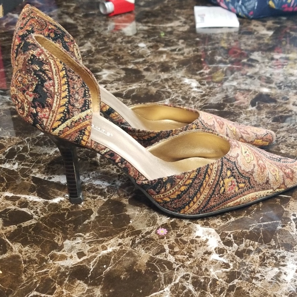 Multicolored brown heels.